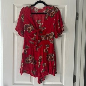 Red floral romper with tie front